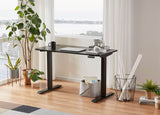 Upgrade your home office with our sleek and stylish black Sunaofe Tau2 standing desk. The black finish adds a touch of elegance to any space, while the dual motor system and adjustable height settings make it easy to find the perfect working position. This scenario photo showcases the desk in a cozy home office setting, complete with ergonomic accessories for optimal comfort and productivity. Experience the benefits of a healthier and more efficient workday with our versatile standing desk. Shop now!