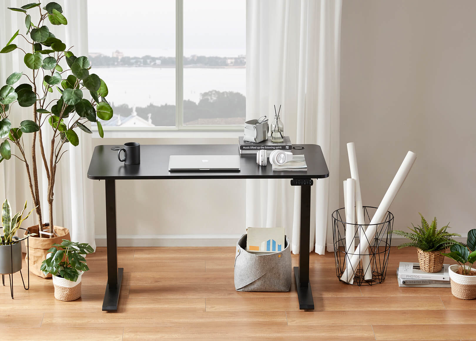 Black standing desk Tau2 in modern home office with dual motors